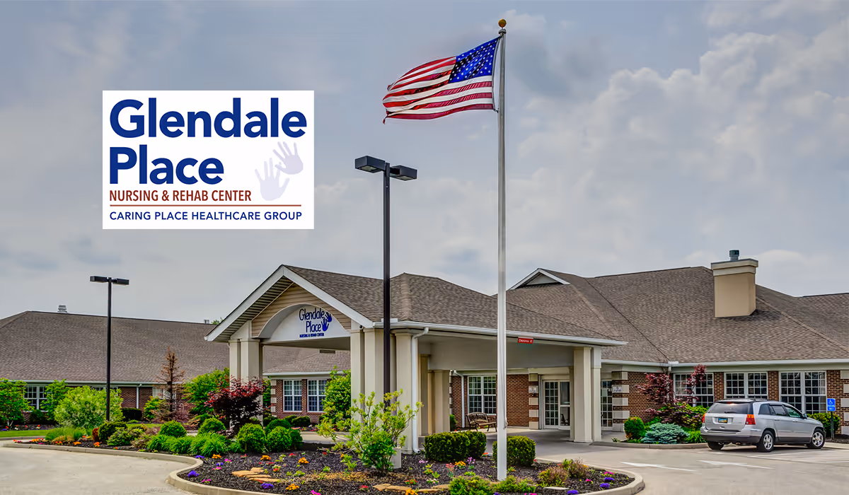 Glendale Place Care Center building exterior with entrance, flagpole, landscaping, and parked car.