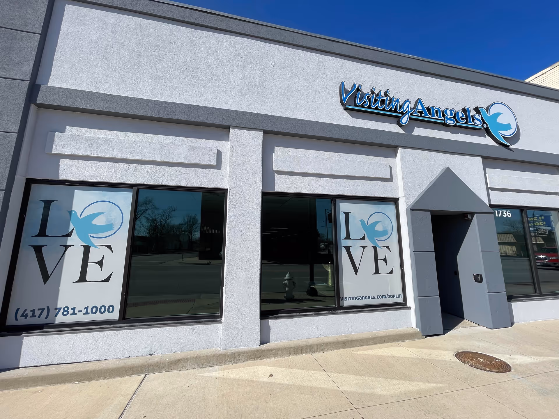 Front of Visiting Angels Senior Home Care Joplin storefront with large display windows