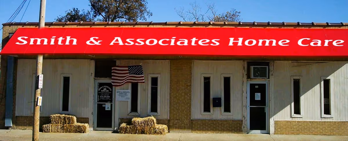 Exterior of Smith and Associates Home Care building with a bright red sign across the front.