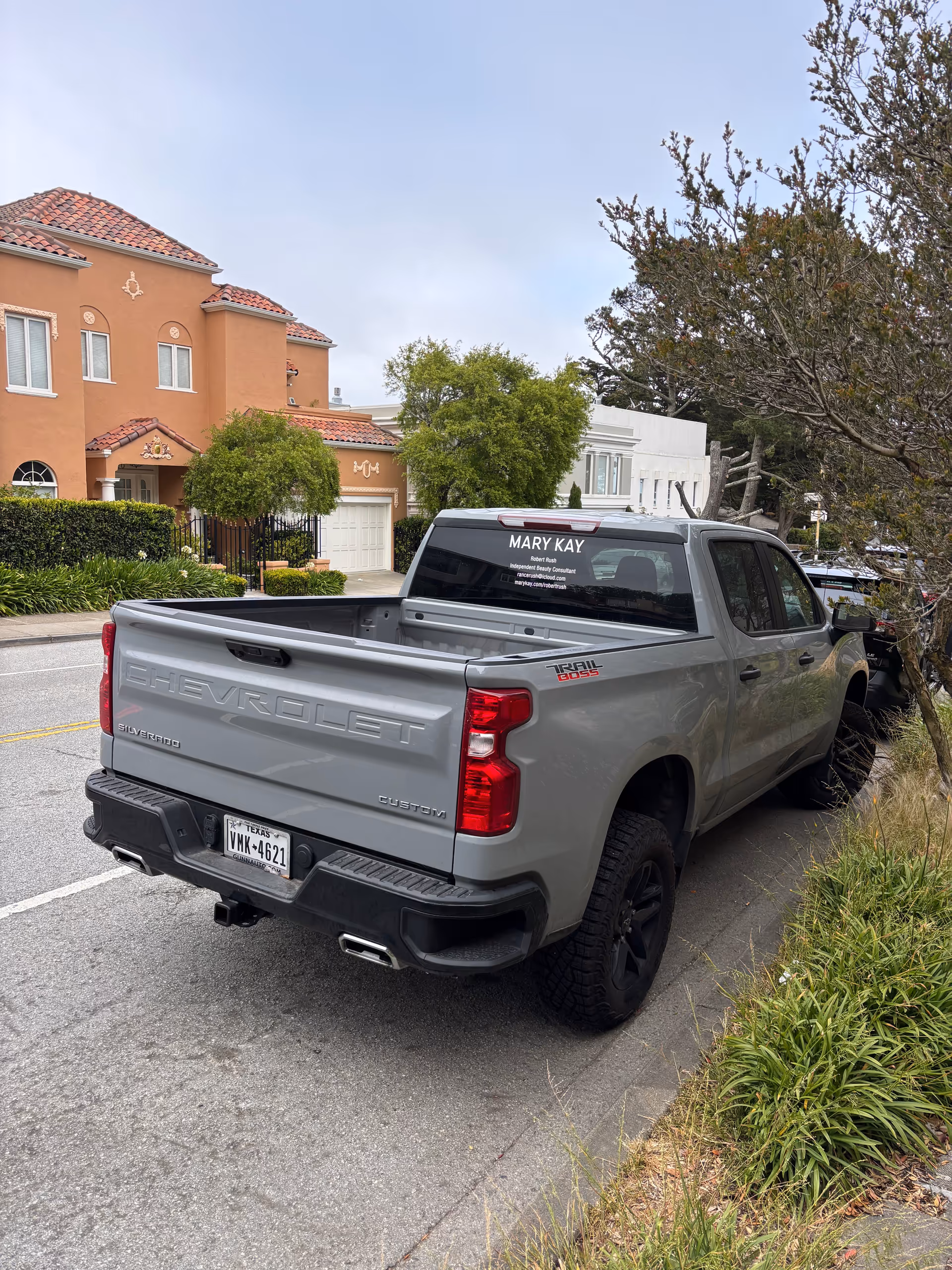 Rear view of a gray Chevrolet Silverado parked on a street near Laguna Honda Hospital