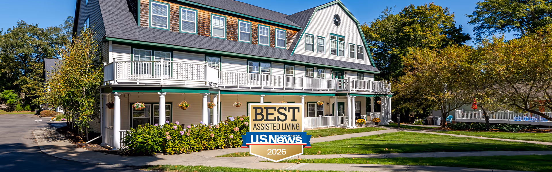 Exterior view of Crescent Point at Niantic building with a Best Assisted Living sign.