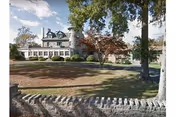 Exterior view of Silver Stream Nursing and Rehabilitation Center with manicured lawn and trees.