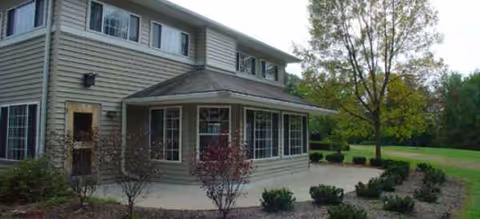 Brookdale Lakewood senior living building with covered entrance and landscaped grounds.