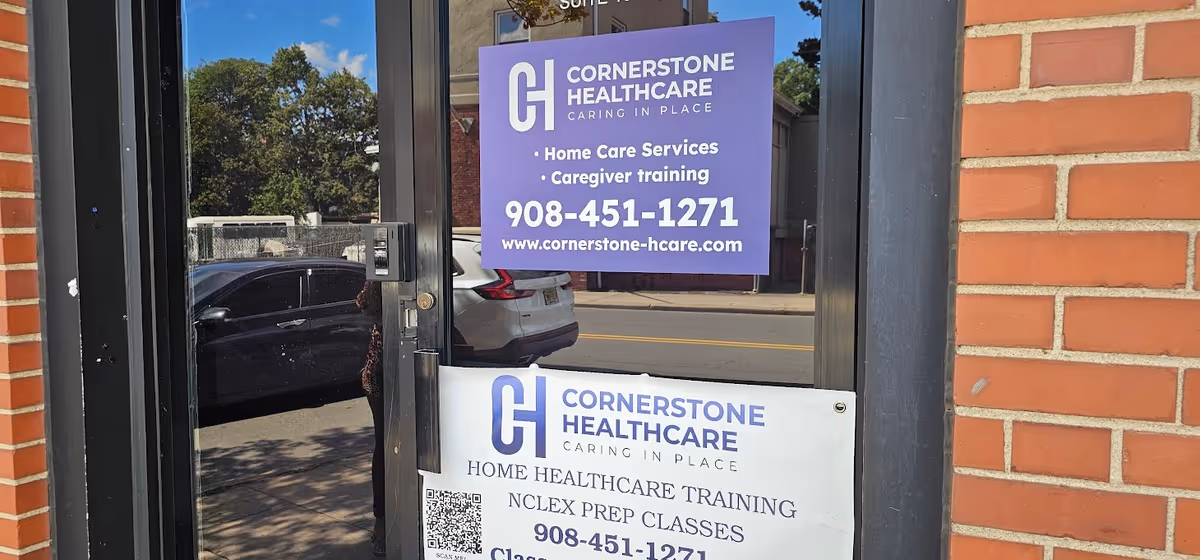 Brick building entrance with Cornerstone Healthcare signs advertising home care services