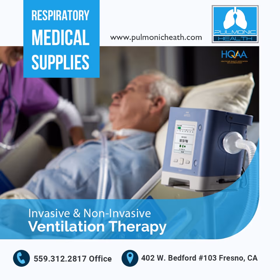 A patient lying in bed connected to a ventilator with a caregiver nearby.