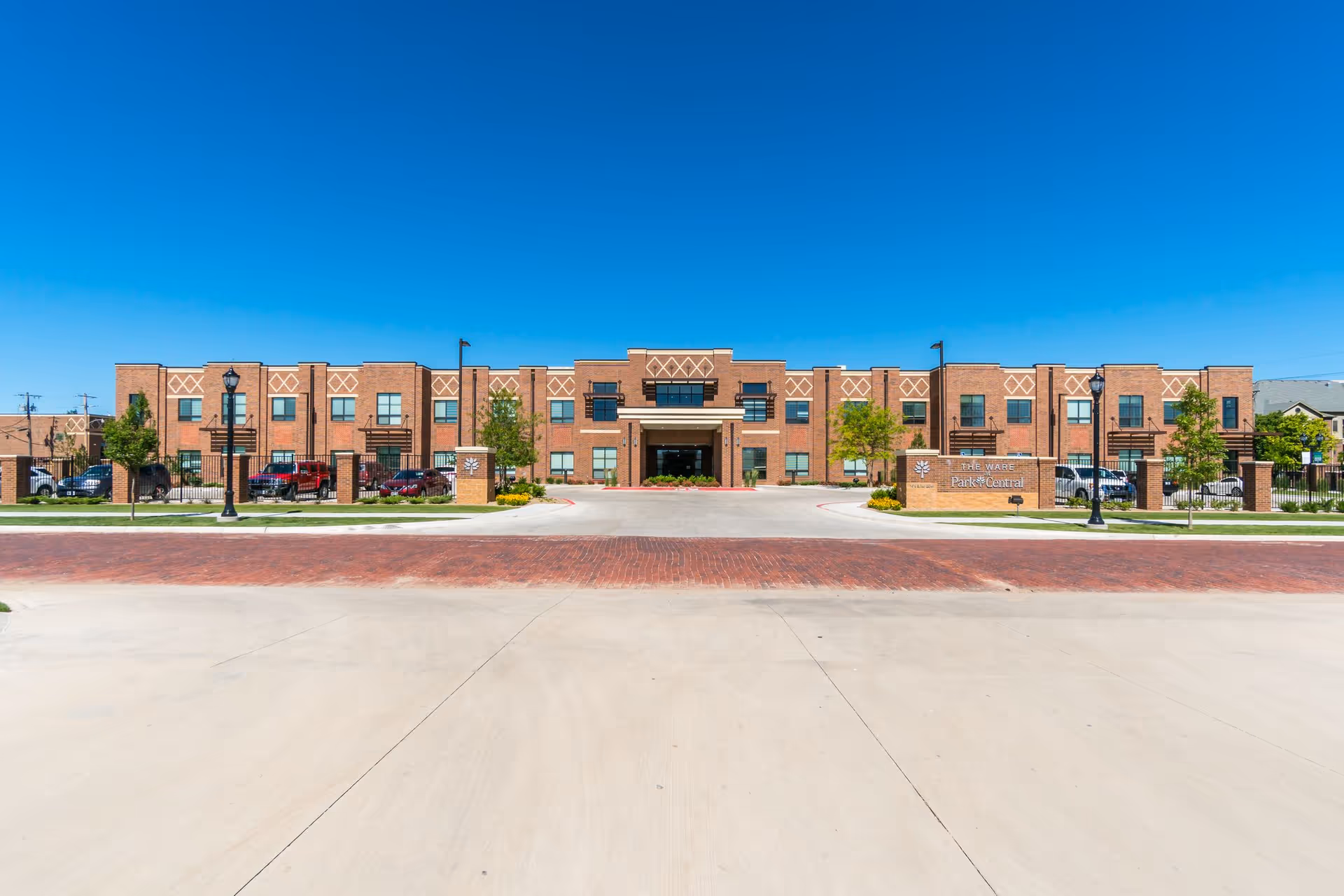 Exterior view of Ware Memorial Care Center building under a clear blue sky.