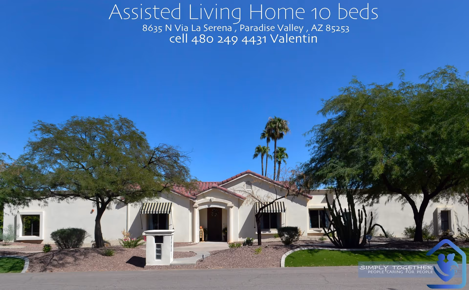 Exterior view of a single-story assisted living building with desert landscaping and blue sky