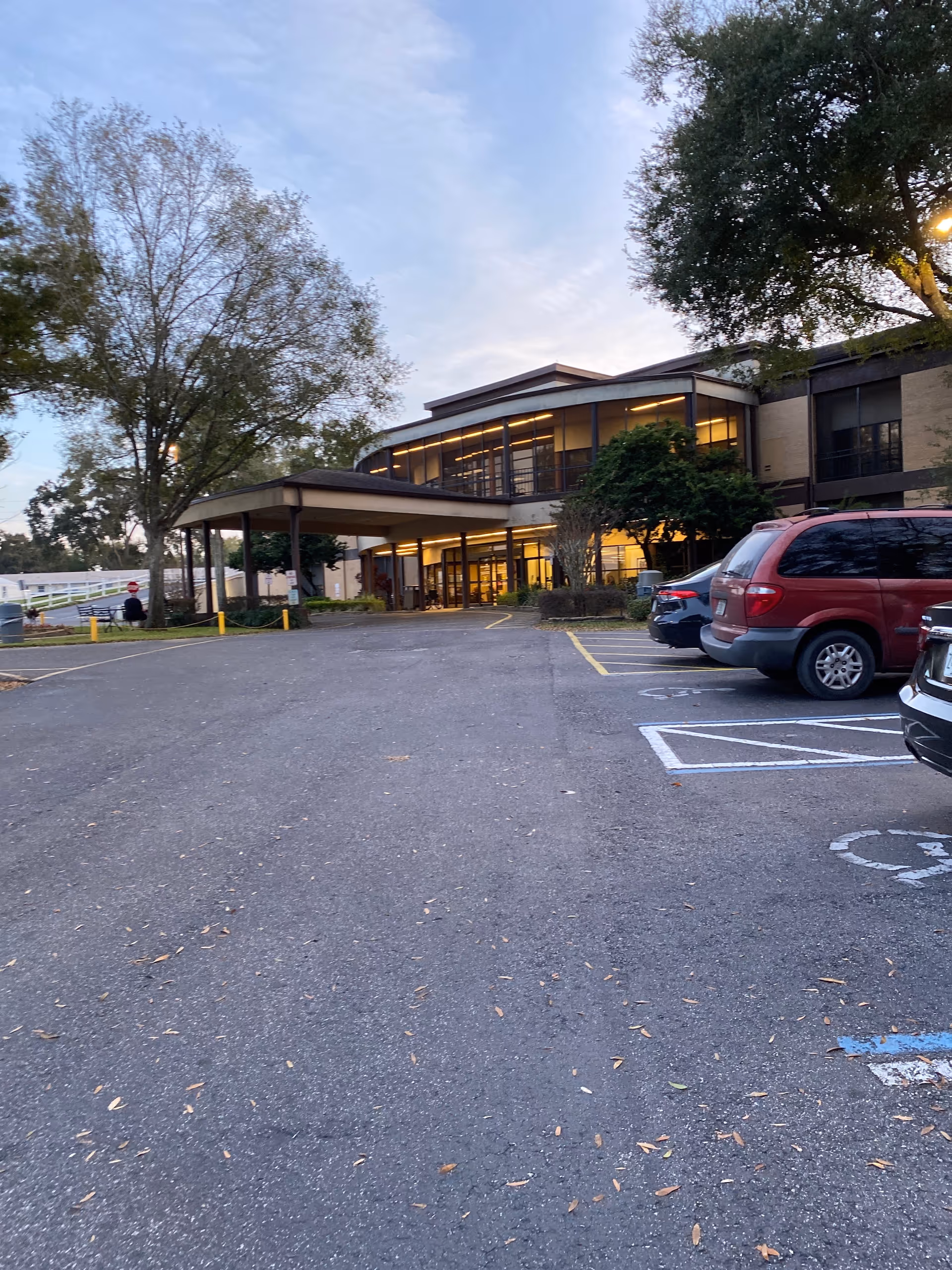 Exterior view of Solaris Healthcare Forest Lake showing the front entrance and parking.