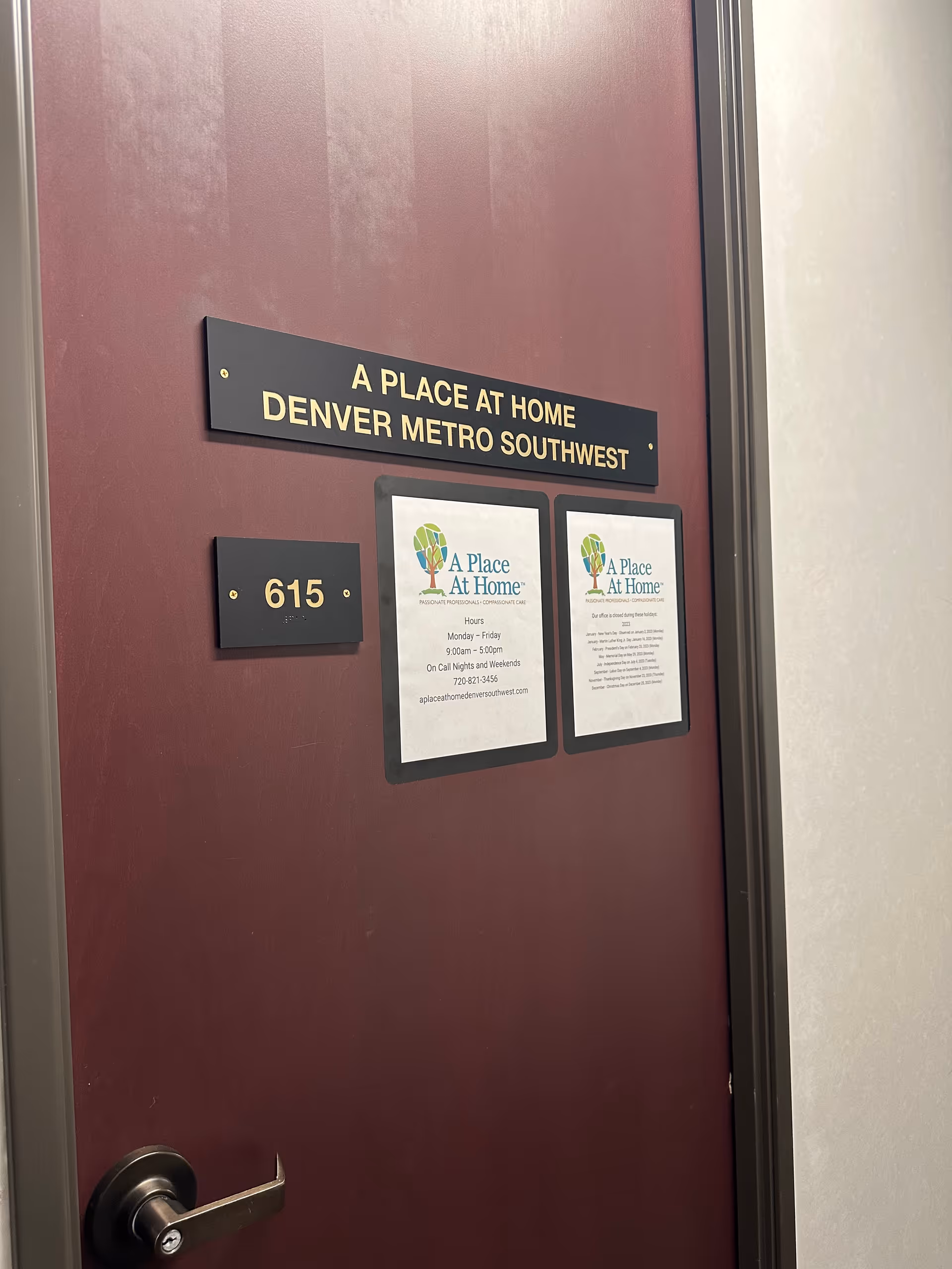 A Place At Home door sign for Denver Metro Southwest with unit 615 and notices.