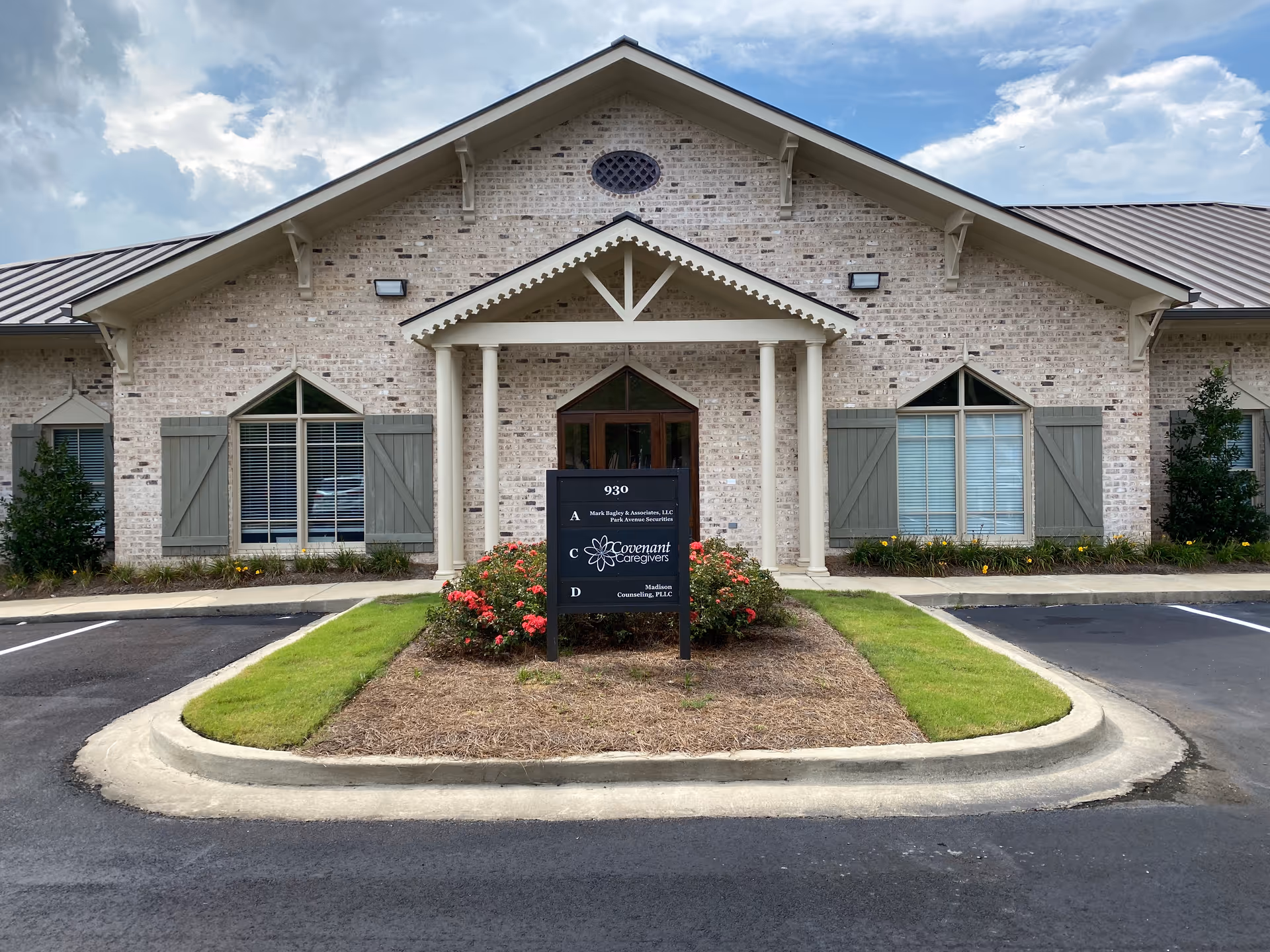 Front view of Covenant Caregivers Home Care building with brick exterior.
