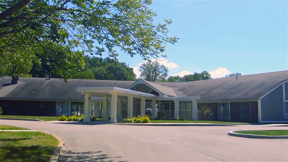 Exterior view of Heritage Health Care Erie with entrance canopy and landscaping.