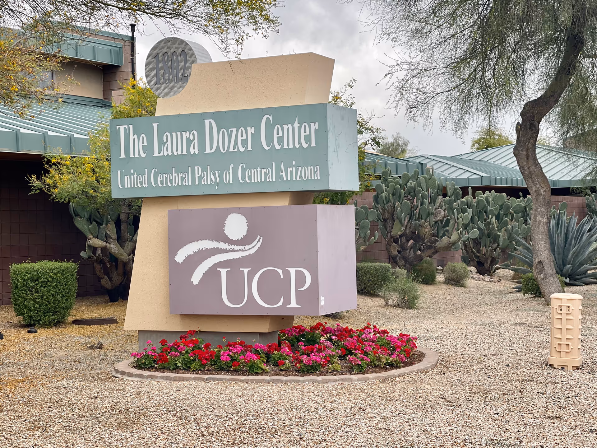 Front view of The Laura Dozer Center sign for UCP of Central Arizona