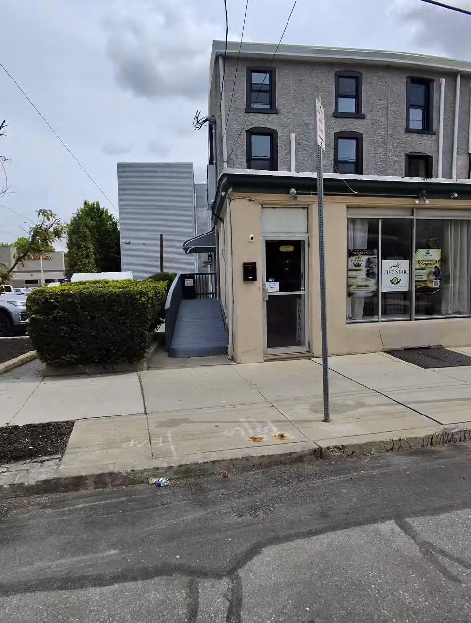 Exterior storefront of Five Star Companion Care on a city sidewalk.