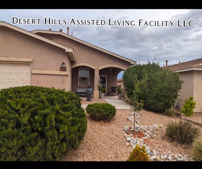 Exterior view of Desert Hills Assisted Living Facility with desert landscaping and a porch.