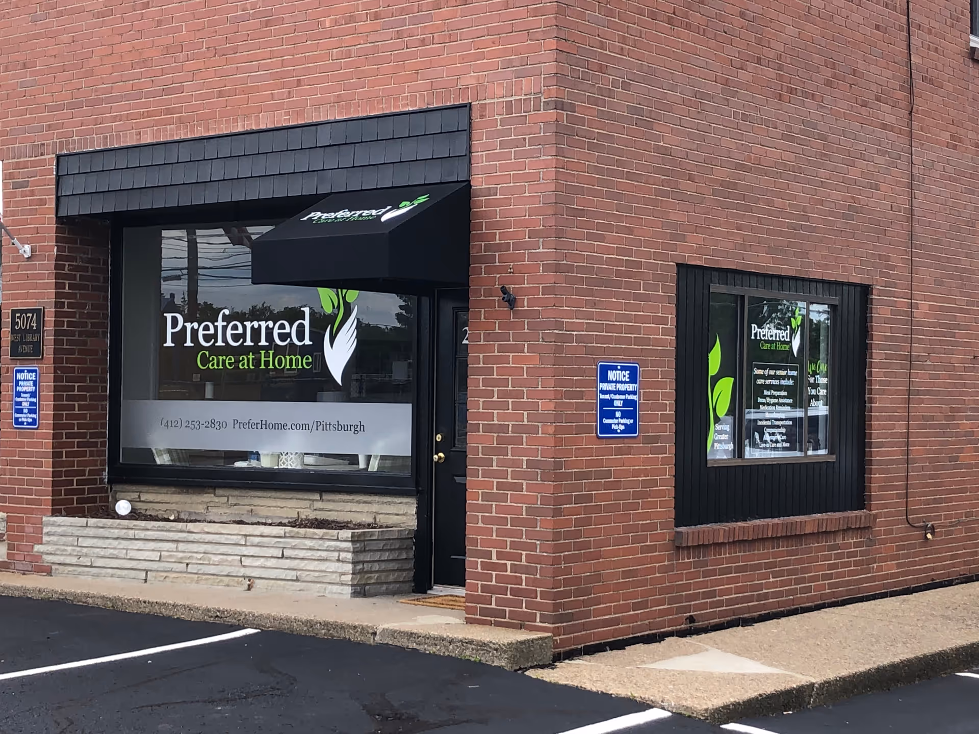 Brick storefront with Preferred Care at Home branding and a large front window.
