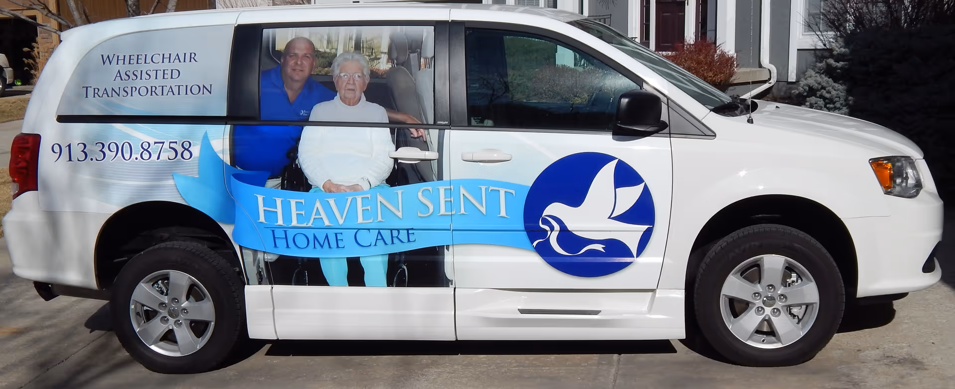 White van with Heaven Sent Home Care branding, parked, two people visible through the window.