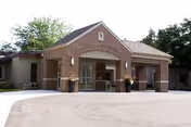 Front entrance of Schnepp Senior Care & Rehab Center in a brick building.
