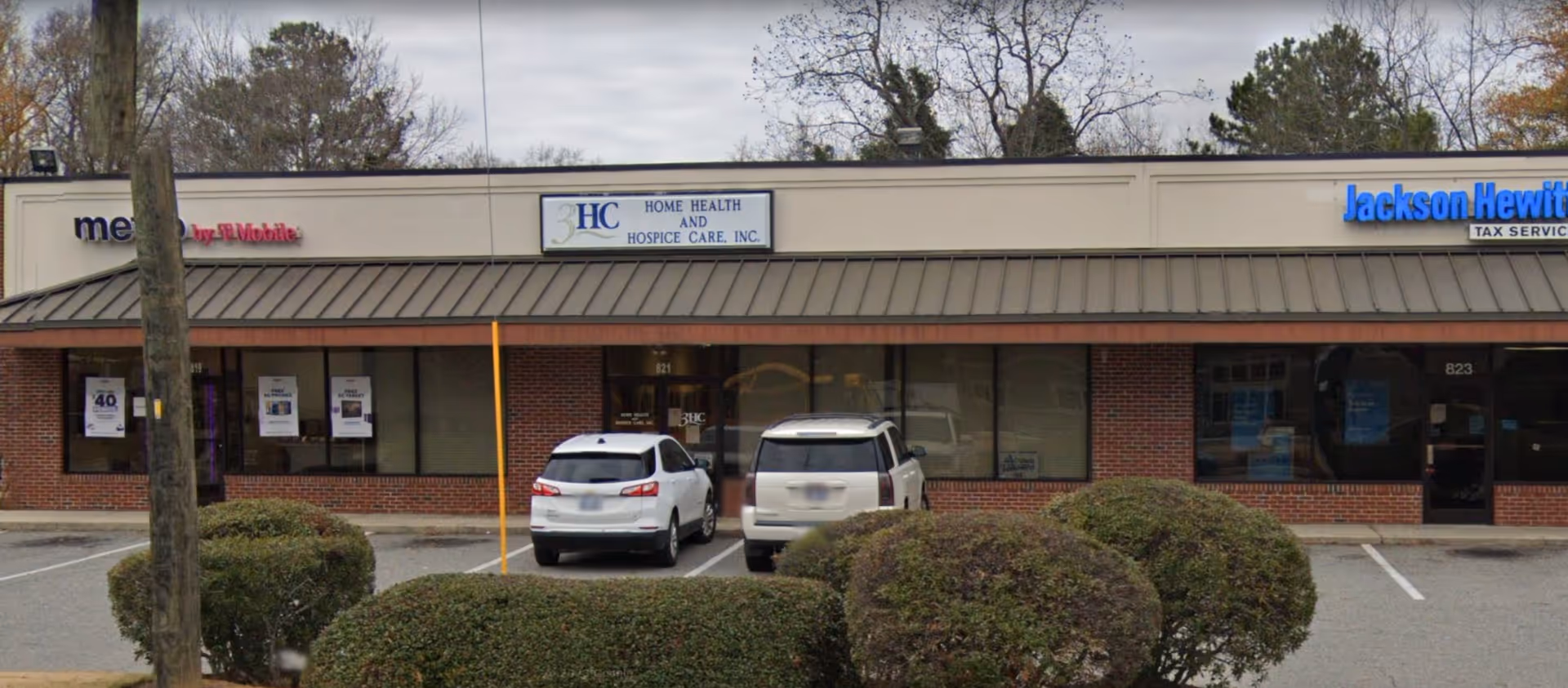 Front view of a strip mall with 3HC Home Health and Hospice Care sign.