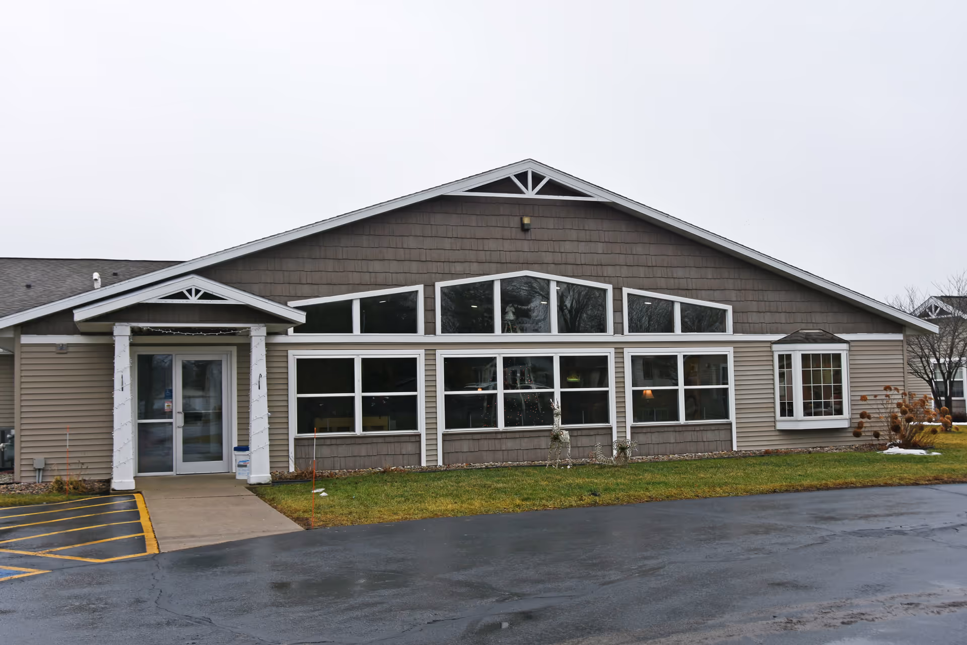 Front view of Prairie Ridge Assisted Living building with large windows and entrance