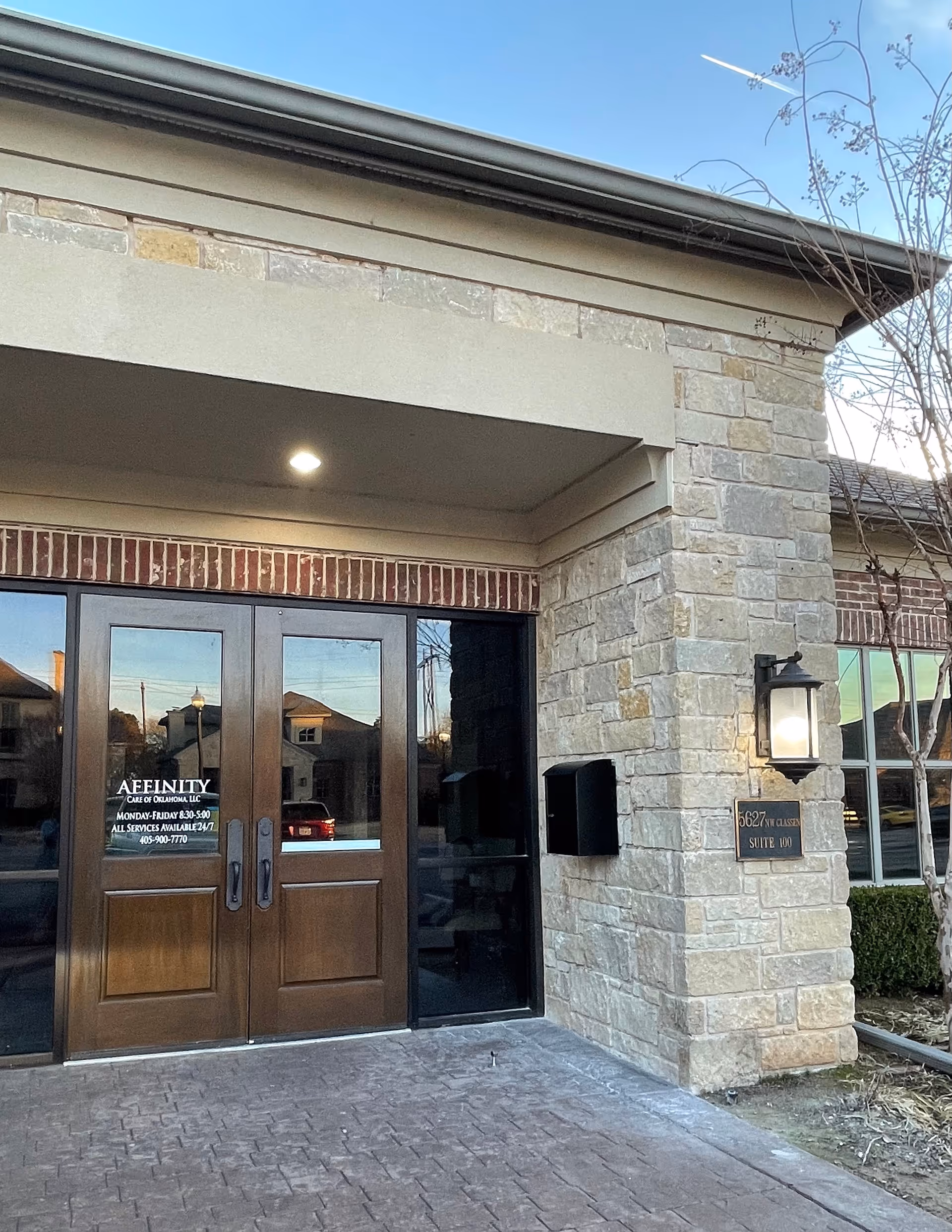 Front entrance of Affinity Care of Oklahoma with brick and stone facade.