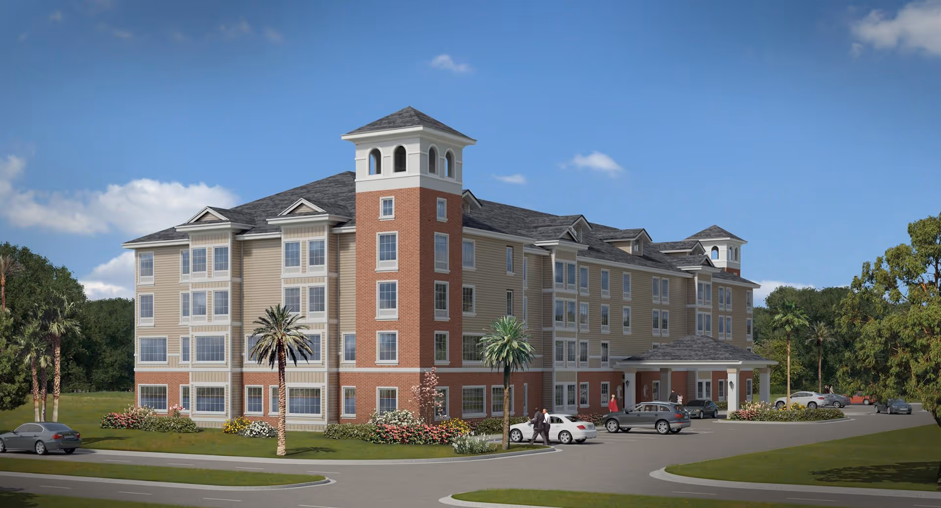 Exterior view of a multi-story senior living facility building with a combination of brick and beige siding, multiple windows, and a covered entrance. There are palm trees, landscaped bushes, several parked cars, and a few people walking near the entrance under a clear blue sky.