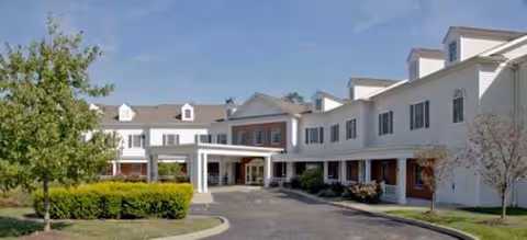 Exterior view of Brookdale Finneytown senior living facility with a covered entrance and driveway.