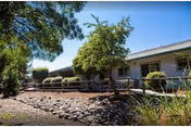 Exterior view of Northridge Center with a front walkway, trees, and landscaping.