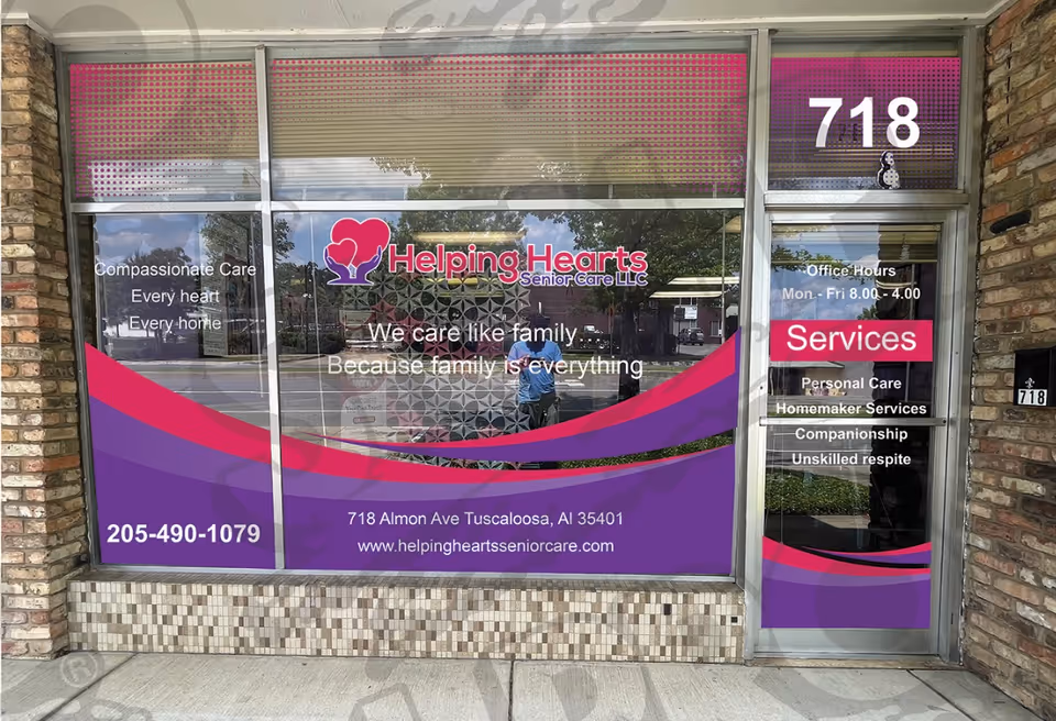 Storefront of Helping Hearts Senior Care with purple signage and large windows