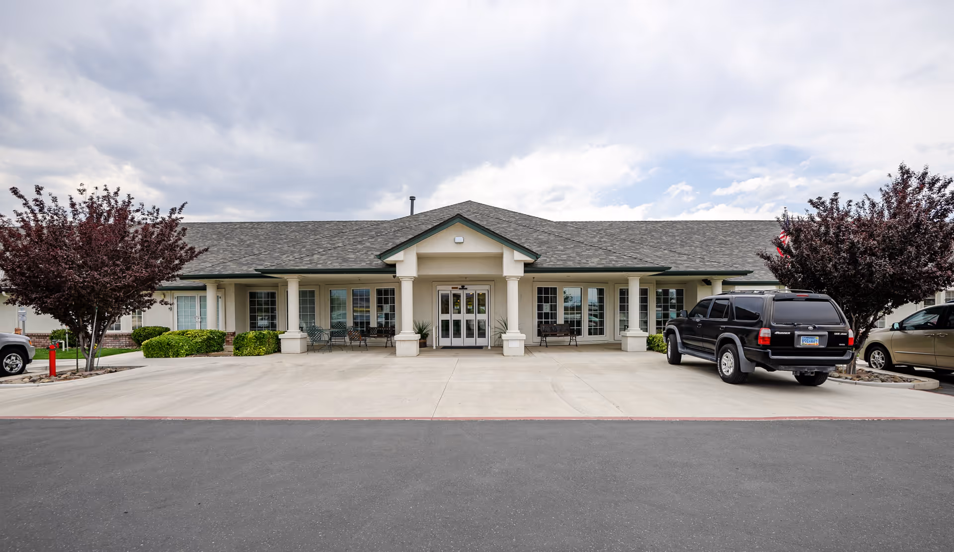 Front view of Volante Senior Living of Carson Valley, a single-story facility with entrance.