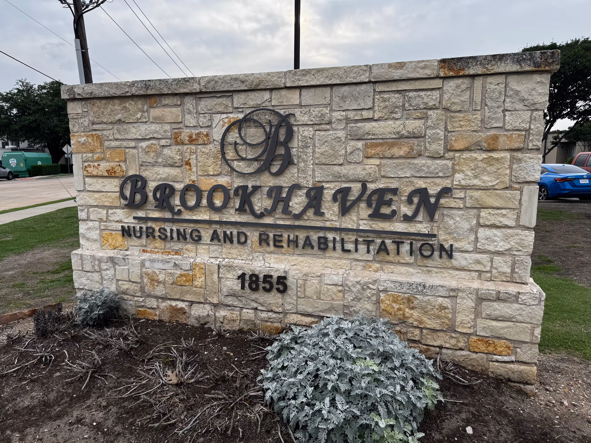 Stone sign reading Brookhaven Nursing and Rehabilitation Center sits at the front entrance.