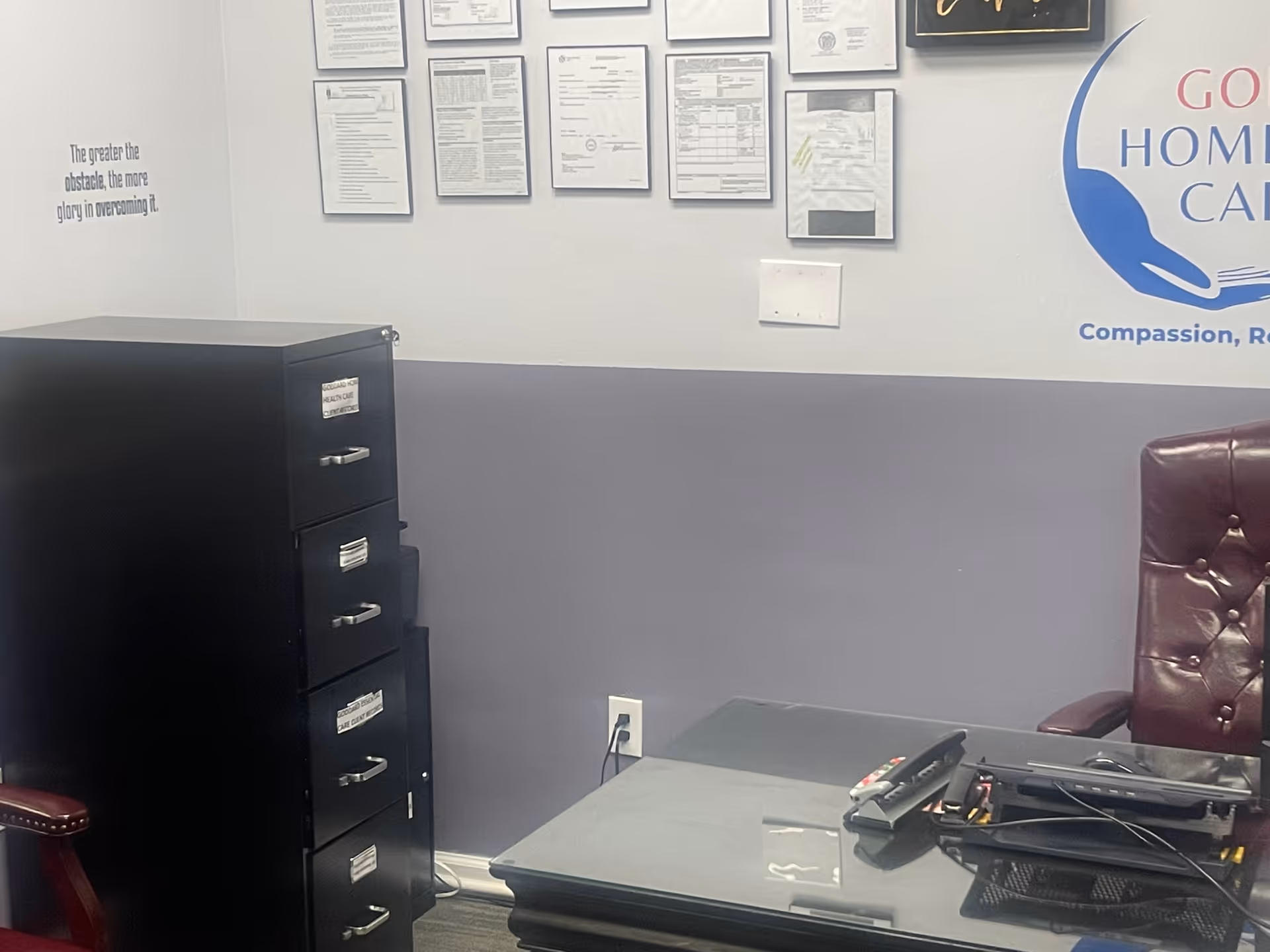 Interior office area in Goddard Home Health Care with filing cabinet and desk.