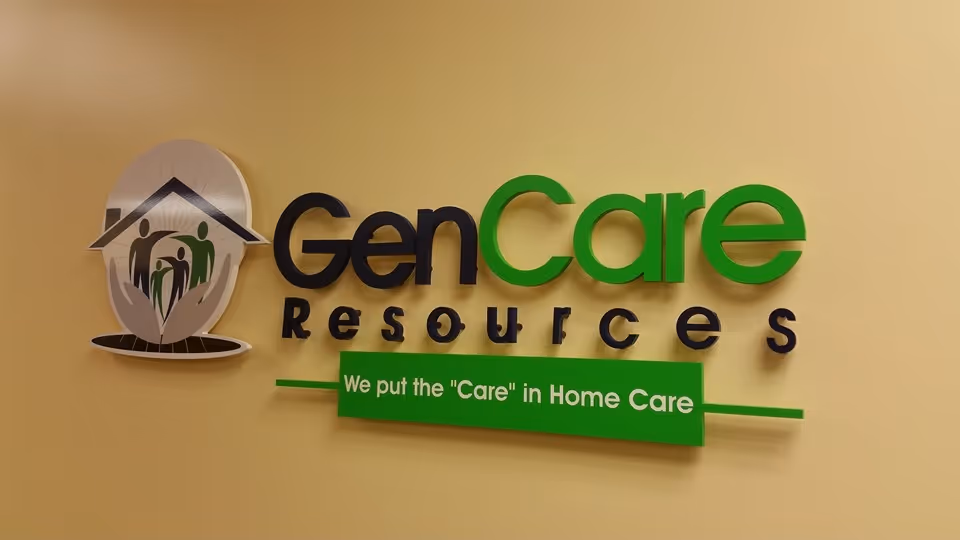 GenCare Resources sign and logo on a beige interior wall inside a facility.