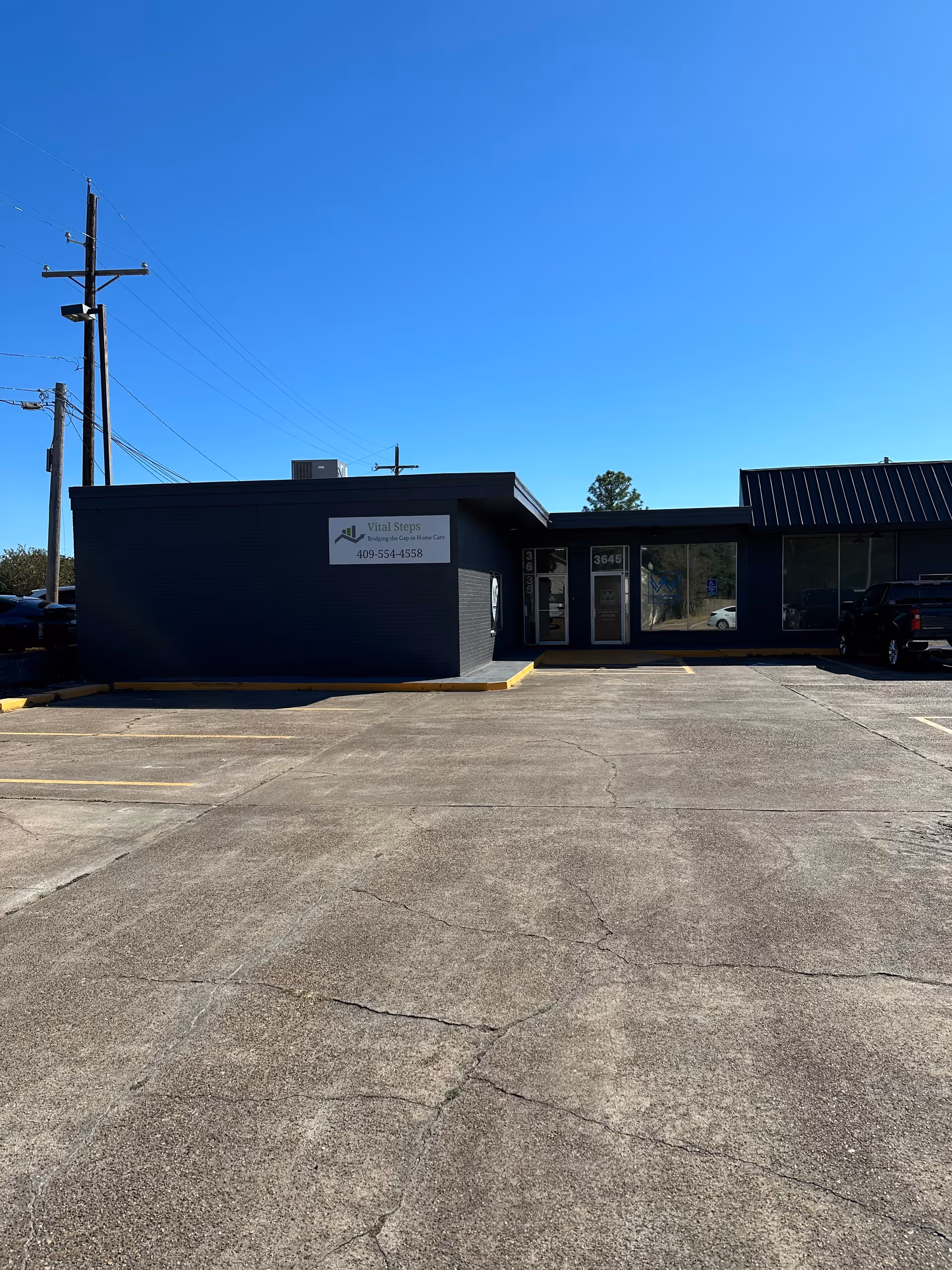 Exterior view of Vital Steps Home Care building with parking lot