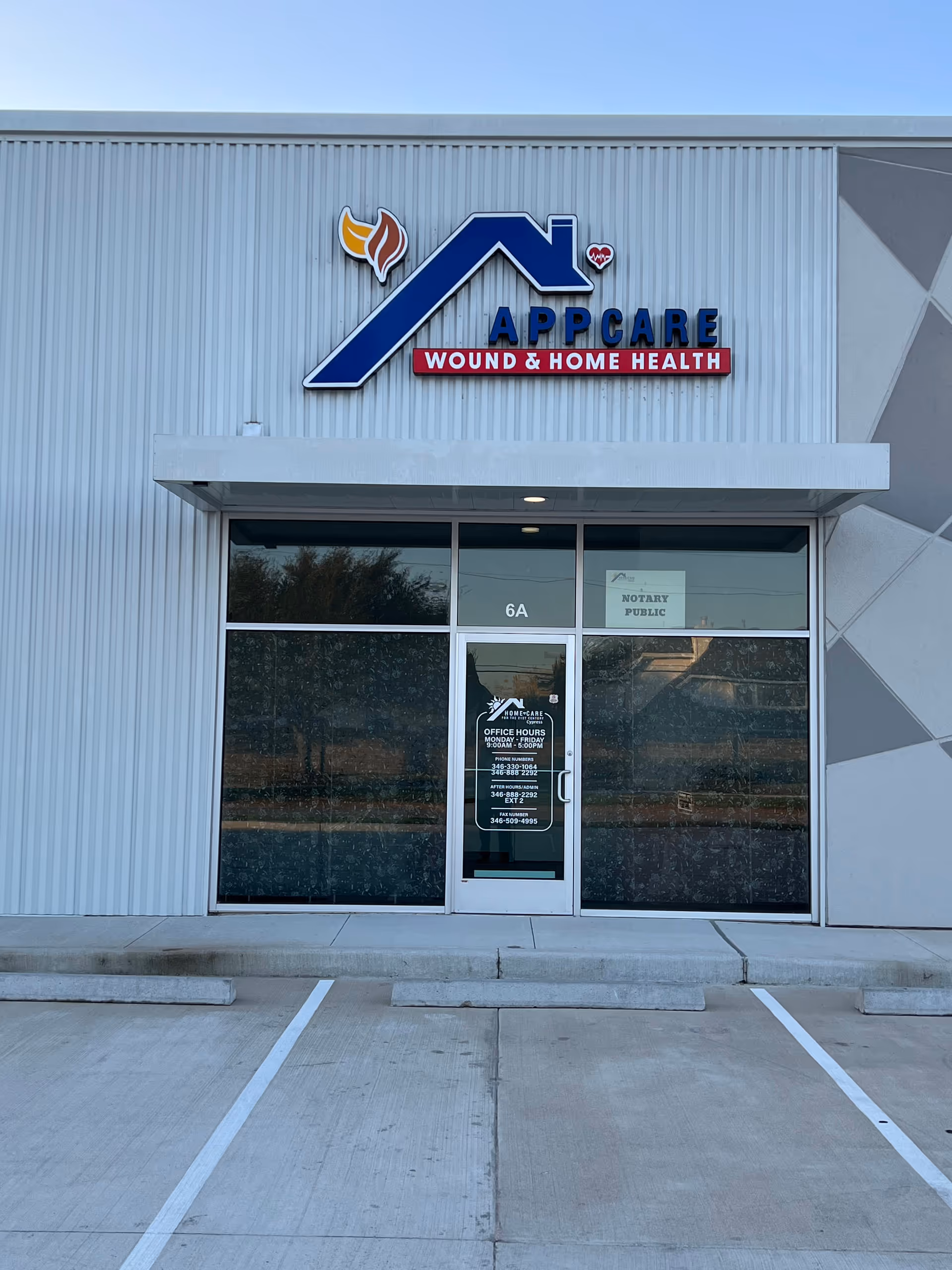 Front exterior of APPCARE WOUND & HOME HEALTH building with sign and glass entrance.