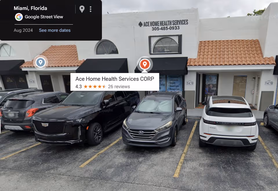Front view of Ace Home Health Services CORP building with parked cars.