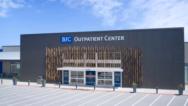 Modern exterior of BJC Outpatient Center Edwardsville with glass doors and wood slats.