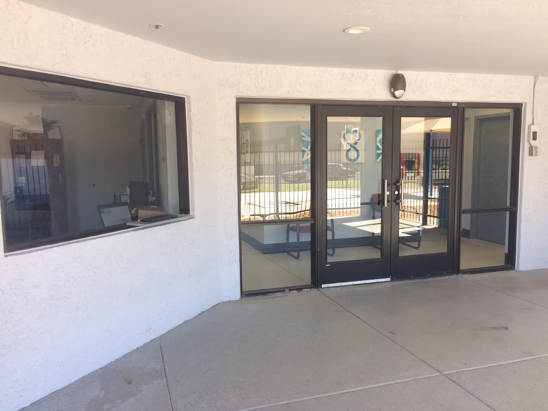 Pathways For Life Glendale entrance with glass doors and a windowed reception area.