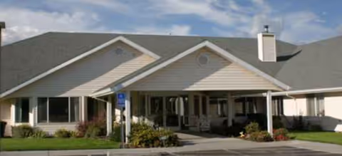 Exterior view of Avamere at Hermiston entrance with a covered drop-off.