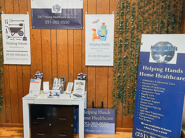 Interior promotional display with banners and brochures advertising Helping Hands Home Healthcare.