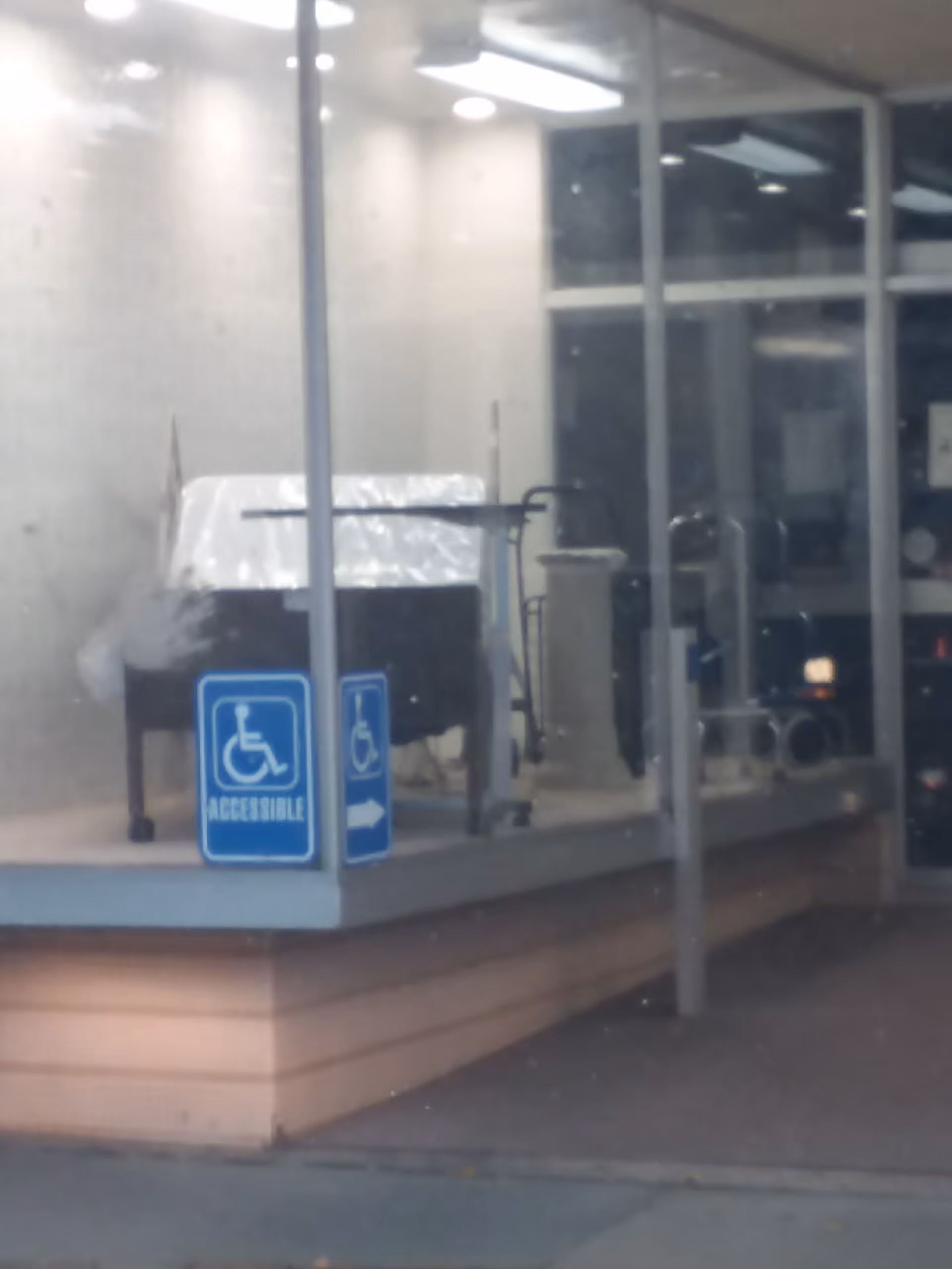 Front entrance of Sobaks Home Medical facility with wheelchair accessibility signs.
