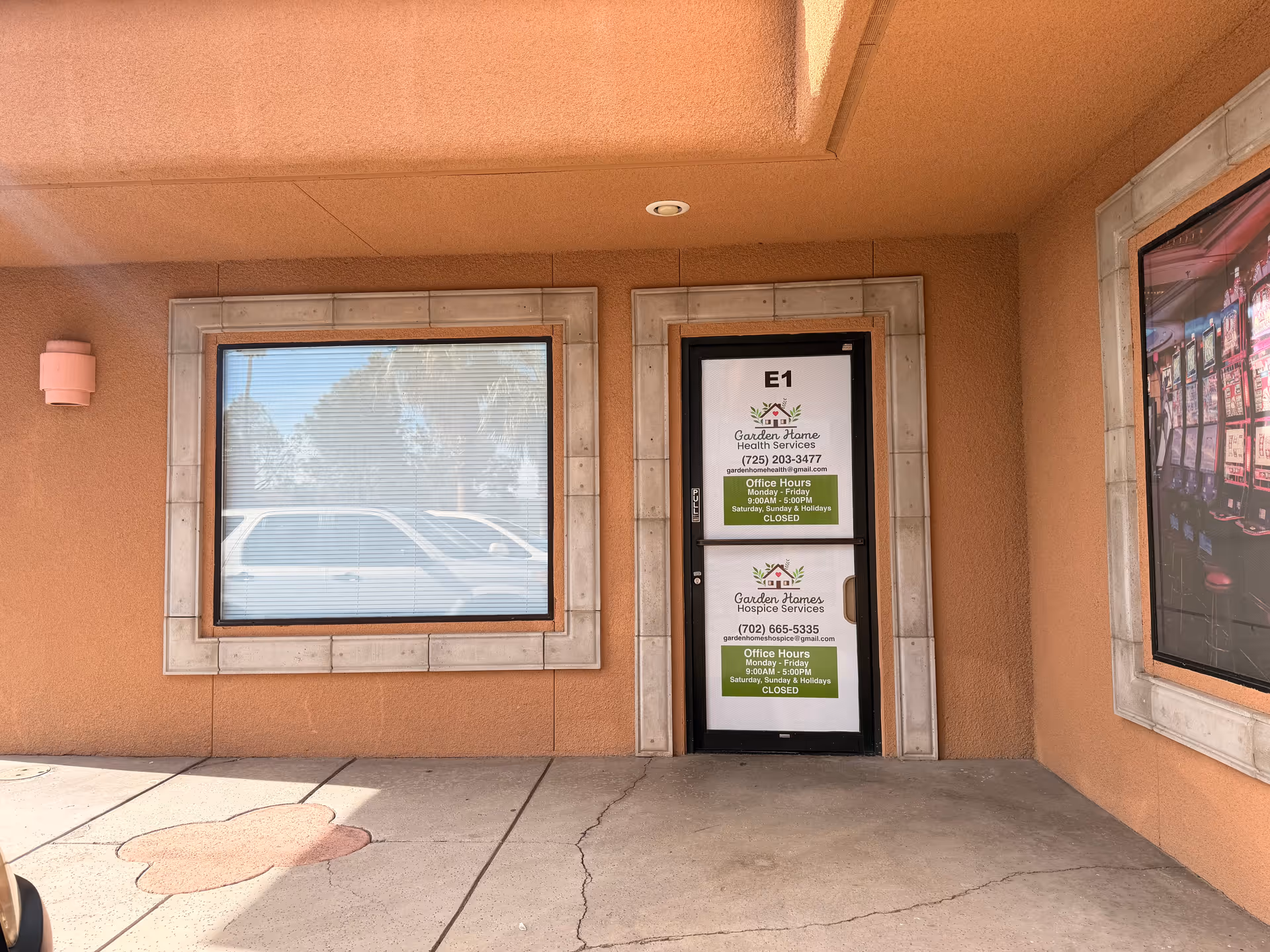 Exterior entrance of Garden Home Health Services with a glass door and window.