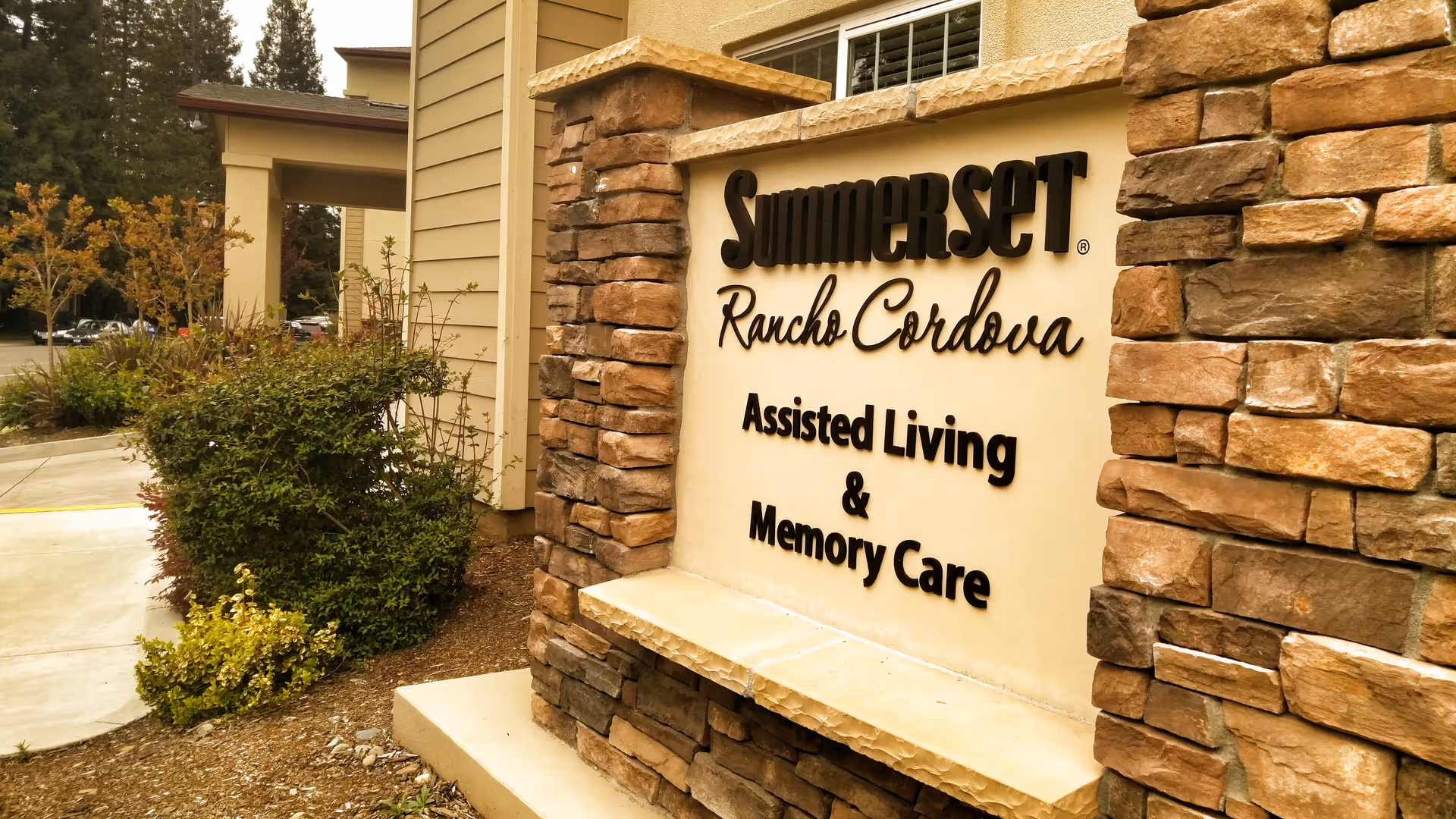 Exterior stone sign for Summerset Rancho Cordova: Assisted Living & Memory Care at the entrance.