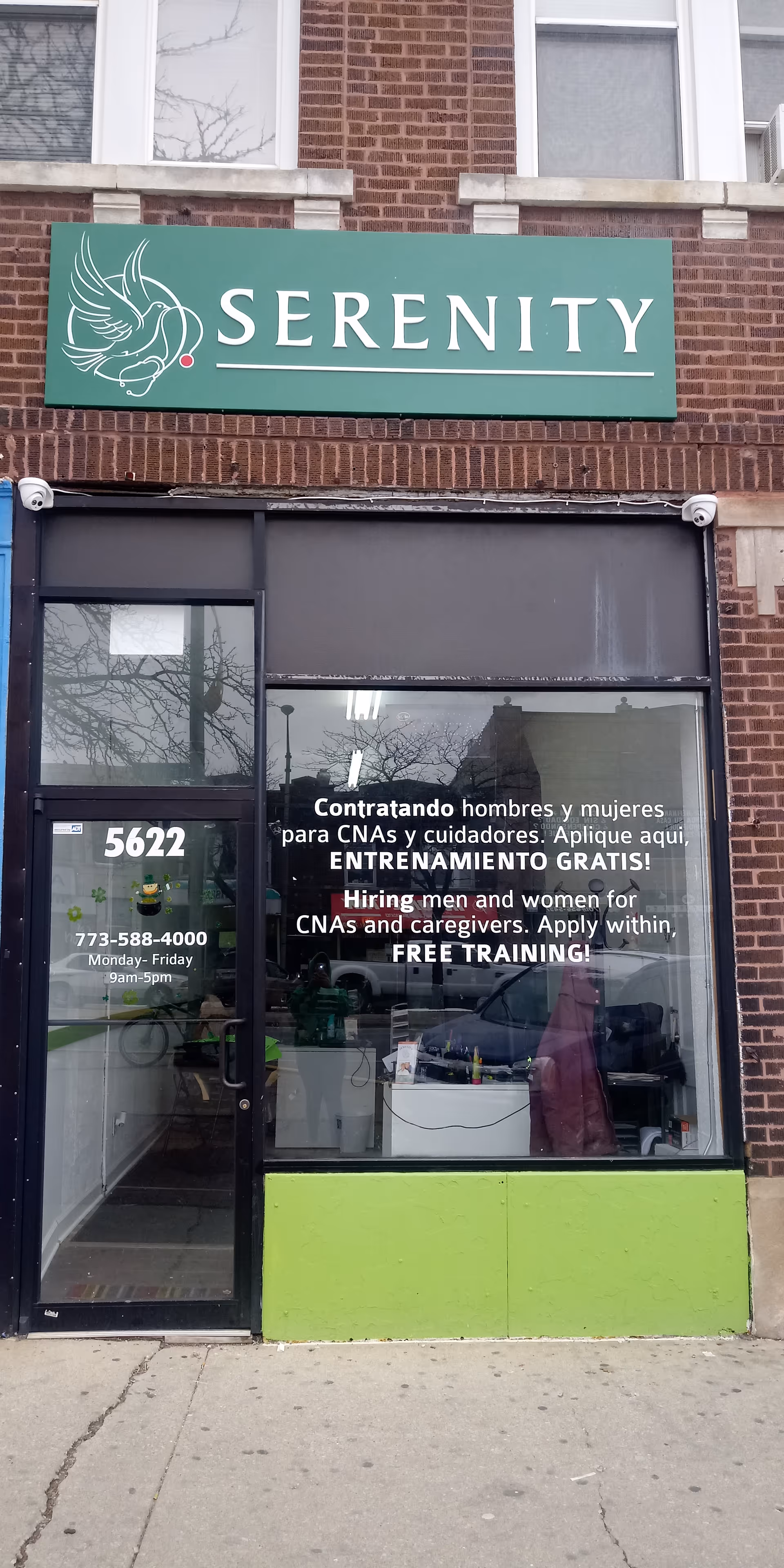 Green Serenity storefront sign above glass entrance for Serenity Home Healthcare in North Riverside.