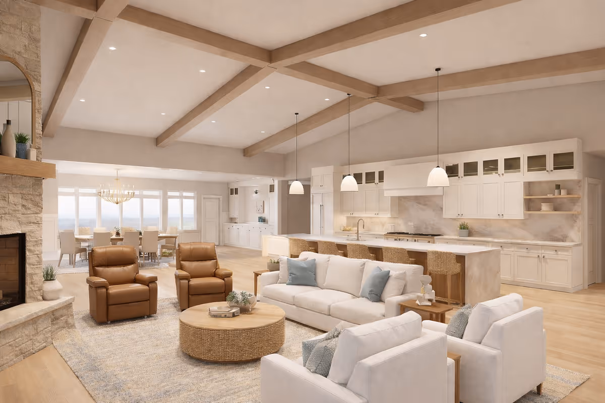 Open living area with white sofas, leather chairs, and a large kitchen island.