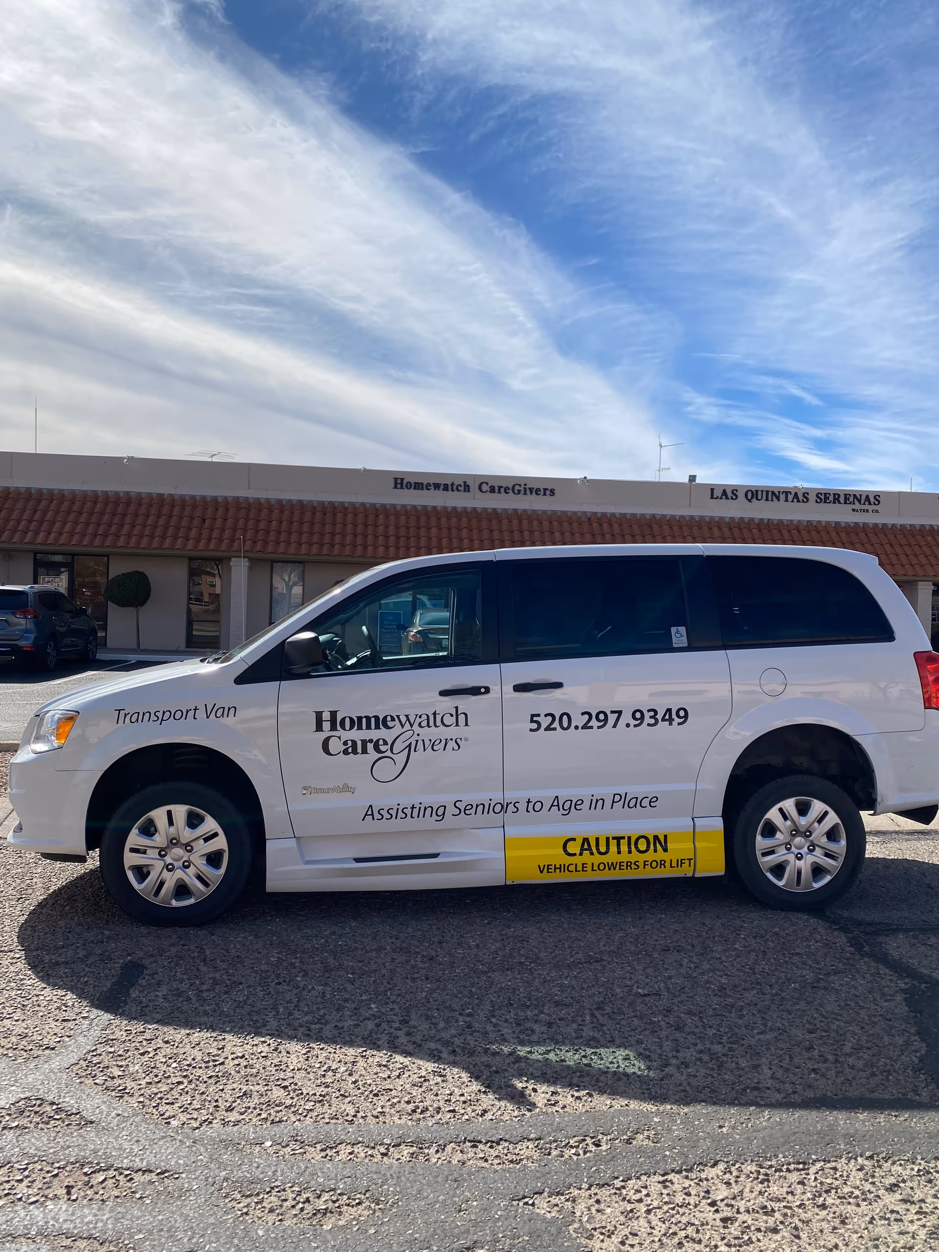 Exterior view of Homewatch CareGivers of Green Valley with a transport van parked outside.