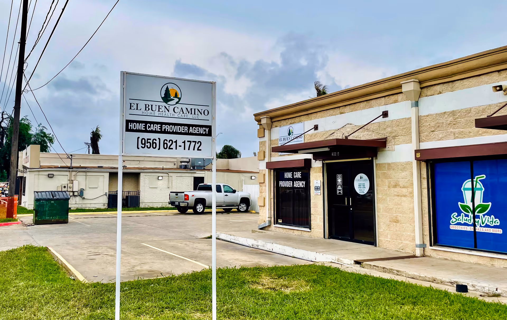 Exterior view of El Buen Camino Home Health Care facility with front sign and entrance