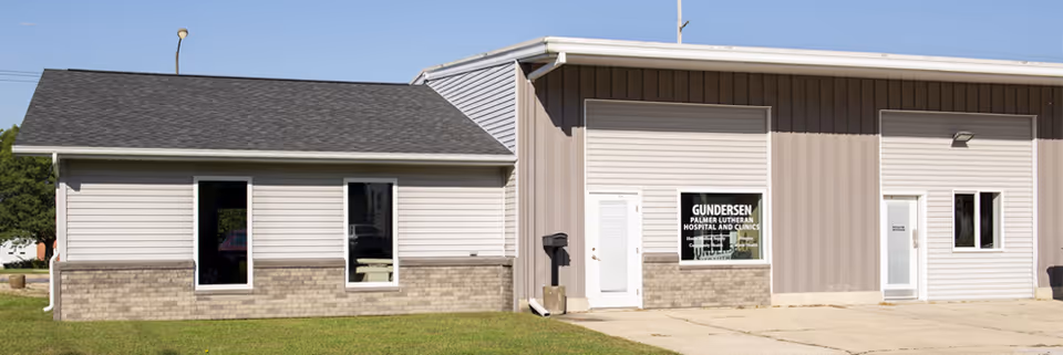 Exterior view of Gundersen Palmer Lutheran Home Medical Supply Oelwein building with two doors and windows
