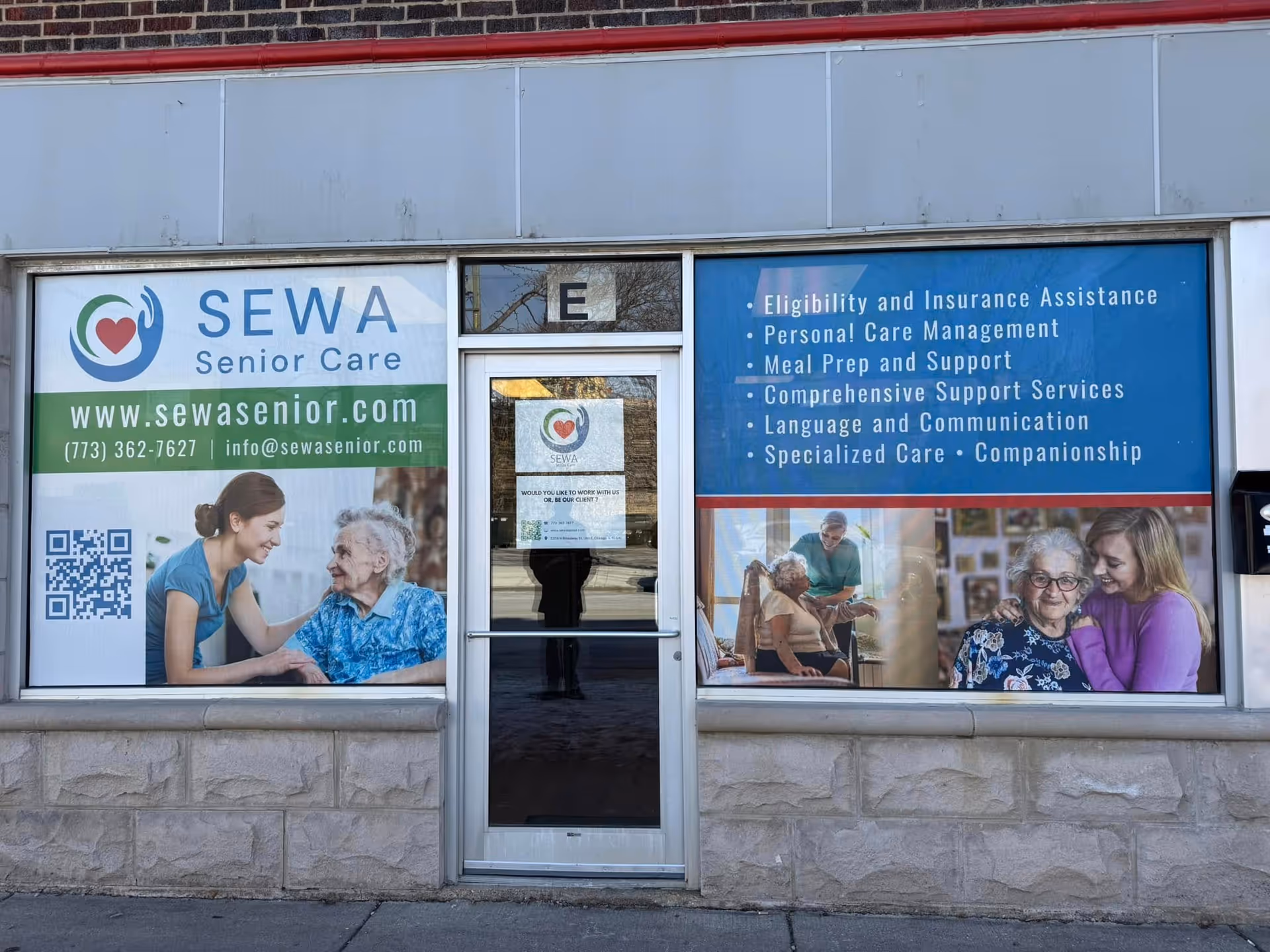 Front of SEWA Senior Care storefront with large service banners and door.