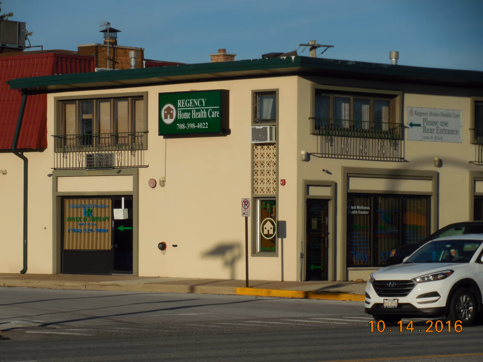 Exterior view of Regency Home Health Care building on a street.