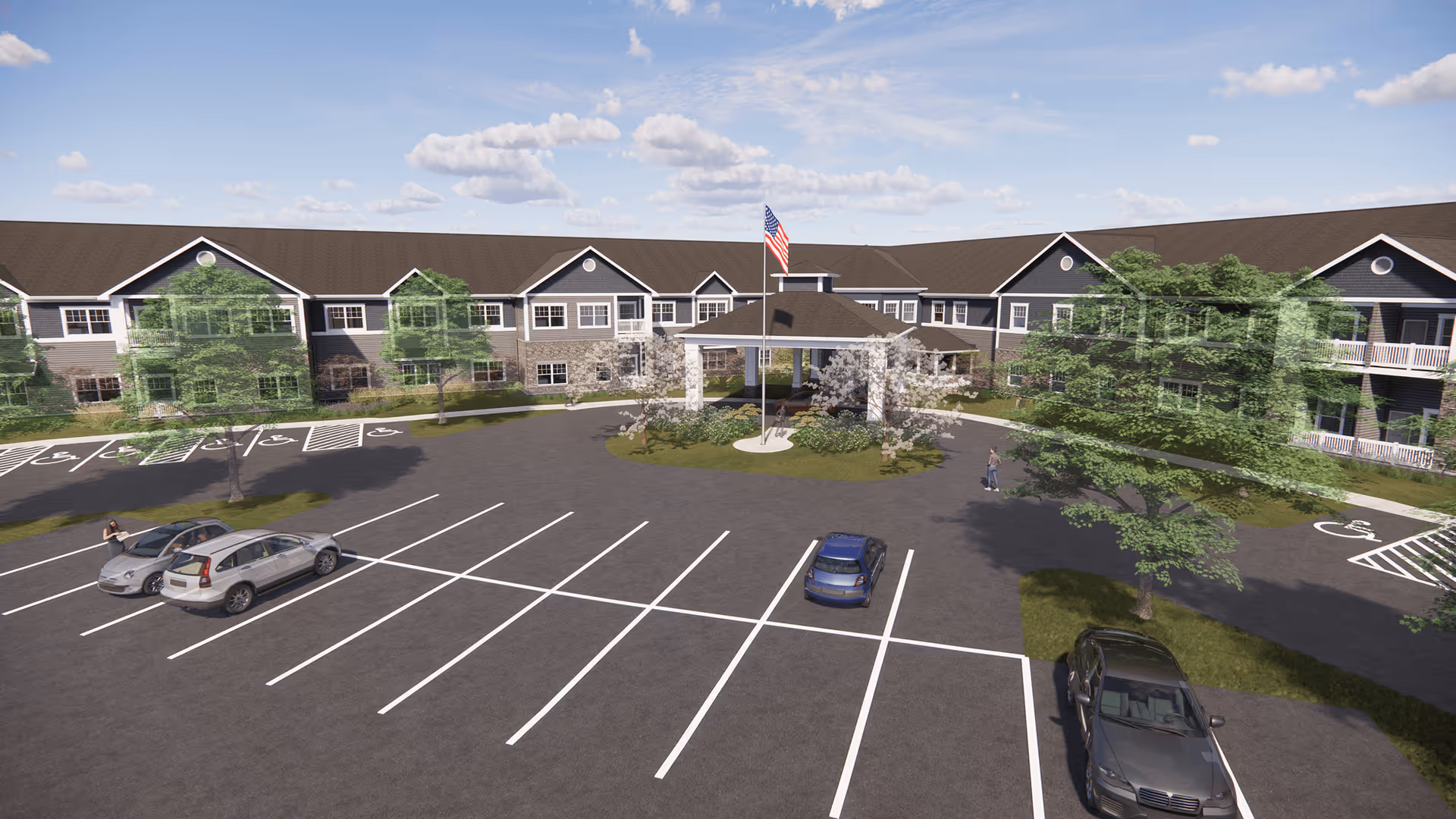 Exterior view of Kingsbury Senior Living Lancaster with a large parking lot and entrance.